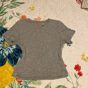 Light gray and barley worn it’s a size large but fits like a small